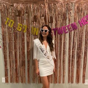 White, fringe sleeve, deep cut dress